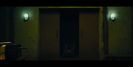 The red button glows faintly in the dark as the last echo of static fades. Everyone’s breathing