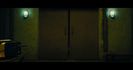 The elevator groans as it descends into darkness, then halts with a violent jolt. The air is thick