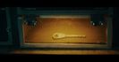 revealing a small brass key. But before anyone can move, the mirror flashes—and a holographic