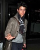 Arriving-at-LAX-Airport-9-12-09-nick-jonas-9445899-408-512