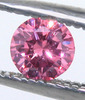 fancy_intense_pink_diamond_in_tweezers2