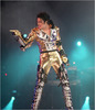 michael-jackson-in-gold-lame-with-leather-buckles-catcher-kneepads-in-history-tour-1992-prague