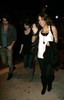 miley-cyrus_COM-la2009feb12-koirestaurant-selenagomez-demilovato-justingaston004