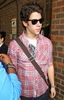 Leaving-The-Langham-Hotel-7-24-nick-jonas-14165811-330-512