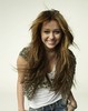 Miley-at-Glamour-magazine-hannah-montana-8367379-488-617