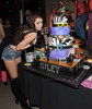 Miley cyrus and her cake