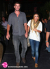 Miley-Cyrus-Liam-Hemsworth-Holding-Hands