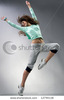 stock-photo-modern-ballet-dancer-dancing-on-the-grey-studio-background-12794116