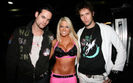 Kelly-Kelly-poses-with-young-Guys-in-Pink