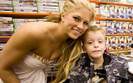 Sylish-Kelly-Kelly-Poses-With-Kid-fans