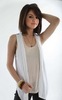 Selena Gomez wears pretty white tank top and black jeans (4)
