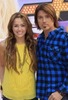 miley-cyrus_COM-hannahmontanamovie-press-madrid-2009apr20-dad007