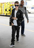 Justin+Bieber+Justin+Bieber+Catching+Flight+k2o2Q-4-D_fl