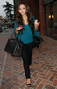 Disney actress Brenda Song hands full leaves BJCqDFkEIEIl