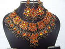 Indian-orange-and-yellow-kundan-jewelry-set-with-maang-tikka-6