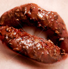 istockphoto_2885875-woman-s-lips-covered-in-chocolate
