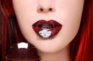 5766387-close-up-shot-of-beautiful-woman-lips-with-chocolate-ice-cream-selective-focus