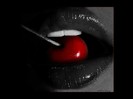 black_lips_white_tooth_and_juicy_red_cherry-800x600