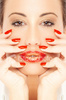 istockphoto_5775460-woman-lips-and-red-nails