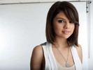 Selena Gomez wears pretty white tank top and black jeans (3)
