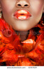 stock-photo-african-young-woman-with-orange-feathers-and-orange-full-lips-30767629