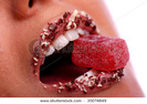 stock-photo-a-woman-mouth-with-candy-inside-35074849