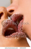 stock-photo-closeup-of-pair-girl-lips-with-sugar-kissing-20642209