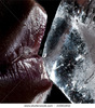stock-photo-closeup-of-wet-lips-kissing-ice-22561852