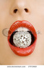 stock-photo-diamond-between-beautiful-red-lips-17972818