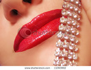 stock-photo-diamonds-are-a-girl-s-best-friend-woman-s-red-lips-with-sparkling-diamonds-across-the-fa