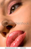 stock-photo-part-of-young-woman-face-with-make-up-14016562