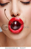 stock-photo-sexy-bite-a-closeup-of-a-young-pretty-women-face-holding-a-yummy-cherry-in-her-mouth-781