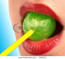 stock-photo-the-girl-with-red-lips-sucks-a-green-sweet-2442121