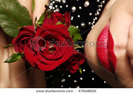 stock-photo-three-roses-in-woman-hand-67668826