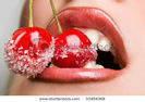 stock-photo-young-woman-s-mouth-with-red-cherries-covered-with-sugar-33494368