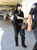 Demi Lovato Demi Lovato Arriving Flight LAX C9-q-NmP2Lal