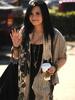 demi_lovato_walking_with_coffee_2011_300x400