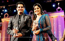 150577-hina-khan-and-karan-mehra-at-star-parivaar-awards-2010