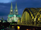 Cologne_Cathedral_and_Hohenzollern_ Bridge,_Cologne,_Germany