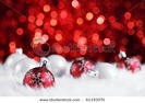 stock-photo-christmas-ball-on-abstract-light-background-shallow-dof-61193074