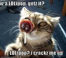 650x1600_funny_pictures_cat_and_lollipop[1]