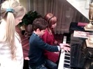 Debby Ryan gives Cameron a quick piano lesson 006