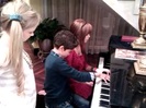 Debby Ryan gives Cameron a quick piano lesson 008
