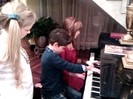 Debby Ryan gives Cameron a quick piano lesson 010
