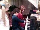 Debby Ryan gives Cameron a quick piano lesson 014