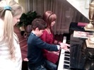 Debby Ryan gives Cameron a quick piano lesson 018