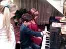 Debby Ryan gives Cameron a quick piano lesson 021