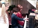 Debby Ryan gives Cameron a quick piano lesson 022