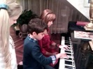 Debby Ryan gives Cameron a quick piano lesson 037