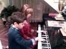 Debby Ryan gives Cameron a quick piano lesson 040